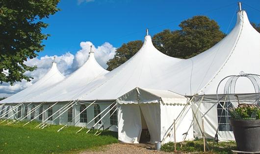 high-quality portable restrooms stationed at a wedding, meeting the needs of guests throughout the outdoor reception in Bloomfield